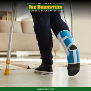 An injury victim walking on crutches after an accident in Augusta due to negligence