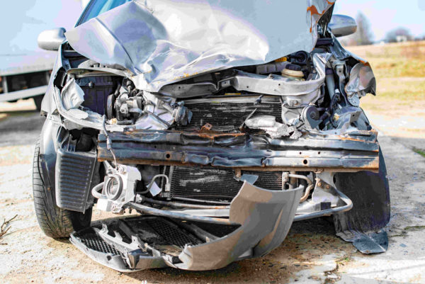Front of a severely damaged car after a major accident.