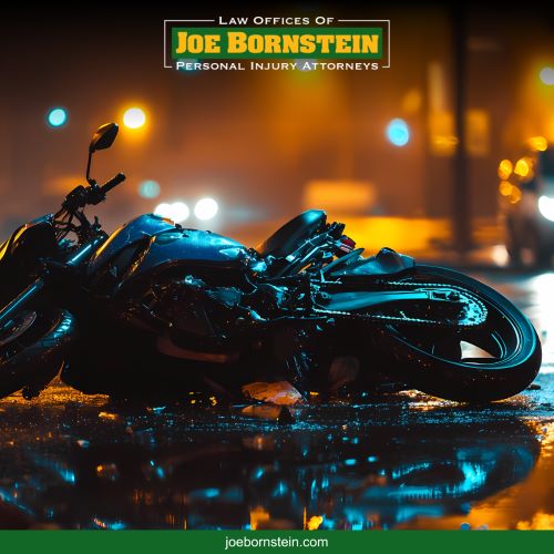 A motorcycle lying on its side after a motorcycle vs. car accident in Portland, ME