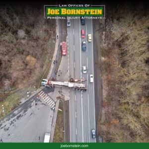 The ariel view of an overturned truck after a serious truck accident in Portland, Maine 